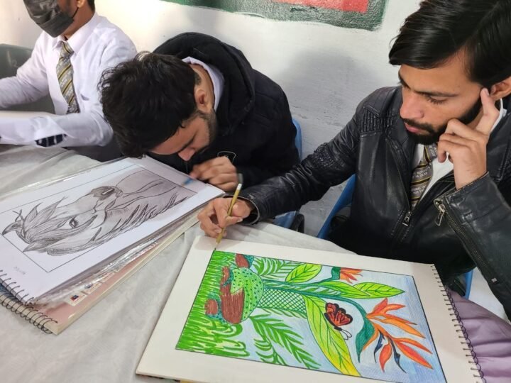 NID students concentrating on their sketches in the art room