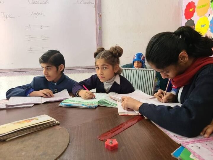 Junior students working in their notebooks